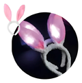 Diadema blanca y rosada de orejas de conejo con luces encendidas
